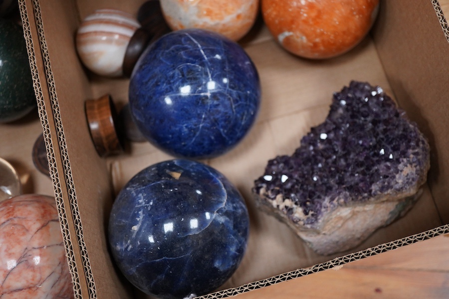 Fifteen marble, quartz and other crystal spheres of various diameters, the largest approx 14cm diameter, and an amethyst geode